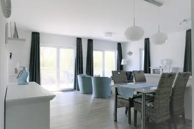 Image de 47. 0. S Waterkant - Sunny vacation apartment directly on the Graft, sauna, free of charge