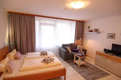 Image de Sünhair with swimming pool and sauna - A combined living and sleeping area with