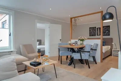 Image de Stadtperle Gold - This vacation apartment is characterized by the harmonious fusion of