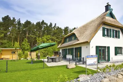 Image de Ferienhaus Seehund - House in a great location with garden, terrace and private sauna