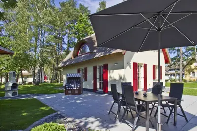 Image de Haus Ostseesonne - close to the beach, quiet location, own sauna, beautiful garden -