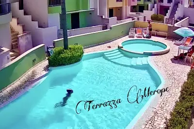 Image de Merope terrace in residence with pool
