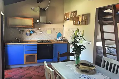 Image de Romantic loft in the center of Suna, 5 min from the beach