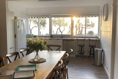 Image de Beachfront Retreat across the road to the beach 🏖
