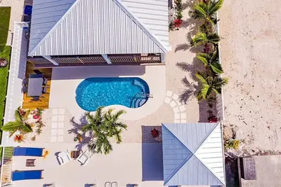 Seas the Day ~ Spacious Waterfront Pool Home, 50` Dock!