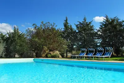 Image de Bel appartement dans une maison de vacances avec Wifi, piscine, Tv, véranda et parking