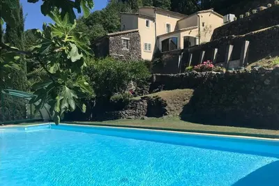 Image de Appartement \" Le figuier\" noyé dans la verdure au pied de la rivière