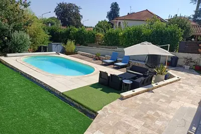 Image de 🦋 Le Petit Cocon - Parking Privé - À 5 minutes Tram & 15 minutes Métro