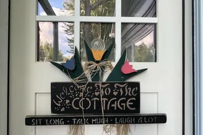 Image de Riverfront Cottage w/ Boat Docking and easy access to Burt Lake