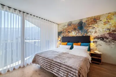 Image de Appartement \"Adler Living Attika Wohnung\" avec vue sur les montagnes, terrasse et Wi-Fi