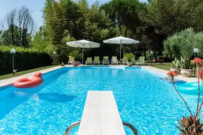 Image de Homerez - Villa à Pise, piscine partagée.