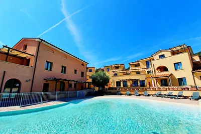 Image de Appartement \"La Pergola al Cavo 5\" près de la plage avec piscine partagée et Wi-Fi