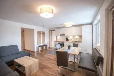 Image de 60 m² modern vacation apartment with balcony, free bathing lake, 100 m to the ski area