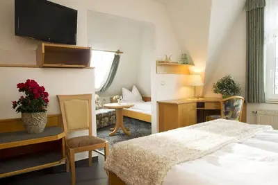 Image de Apartment, shower, Wc, double room with 2 x extra bed - Hotel Heinz