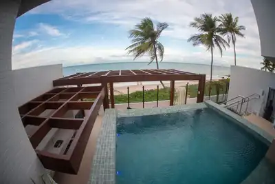 Image de Branco Haus - Pé na Areia do Caribessa