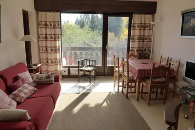 Image de Rez-de-chaussée, vue montagne, balcon, parking, télévision, casier à ski, 60m², Combloux