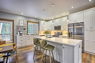 Image de Modern-Chic Interlochen Home w/ Deck & Game Room!