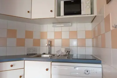 Image de À 10m des pistes de ski, vue pistes de ski, balcon, télévision, casier à ski, 26m², La Plagne