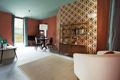 Image de Suite \"Lavarello\" at 2 steps from the lake with private dehor, lounge bar and swimming pool