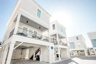 Image de The Sand Haus: A Minimalist Beach Cottage