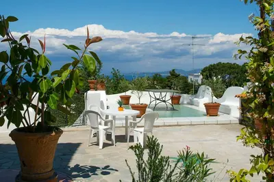 Image de Joli appartement dans une maison de vacances pour 12 personnes avec Wifi, Tv, patio et parking
