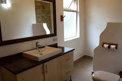 Image de Tranquil 2 bedroom bungalow built amongst the trees, within a resort.