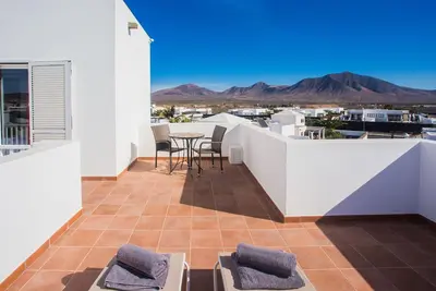 Image de Maison de vacances Playa Blanca pour 1 - 8 personnes avec 4 chambres à coucher - Maison jumelée