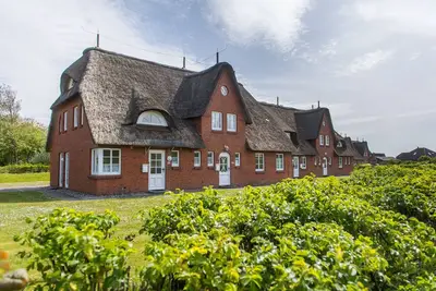 Image de Vacation home in the Friesenhof - Directly behind the dike