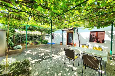 Image de Maison de vacances avec climatisation et terrasse