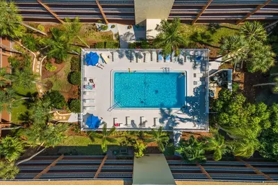 Image de 🍍Condo in Waterfront Comm. w/pool 5min to Beach🍍