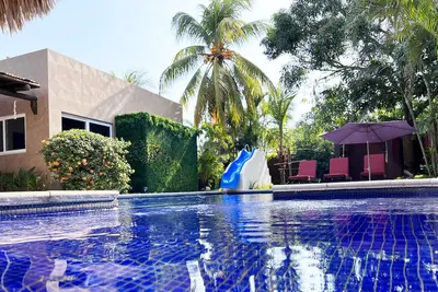 Image de Private family house, with pool, water slide and swings.