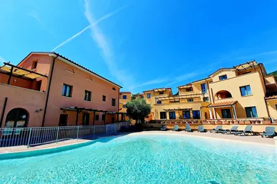 Image de Appartement 'La Pergola al Cavo 9' avec vue sur la mer, piscine partagée, terrasse et Wi-Fi