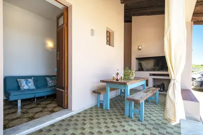 Image de Maison spacieuse à Costa Rossa avec vue partielle sur la mer et terrasse