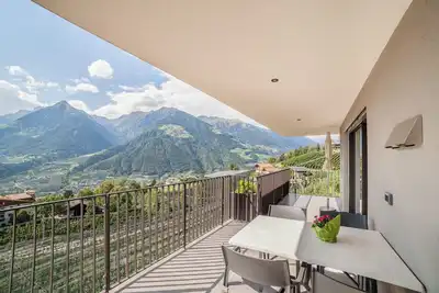 Image de Appartement \"Panoramawohnung Bergerweg\", avec vue montagnes, Wi-Fi et terrasse.