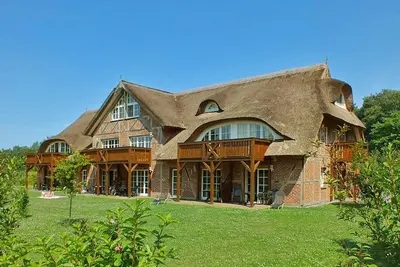 Image de A: Haus an der Düne We 06 ca. 100m Strandentfernung - Haus an der Düne We 06 mit Westterrasse