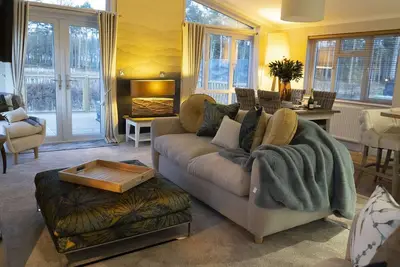 Image de Design-Lodge-Sdb privée-Vue sur le bois