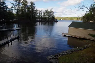Image de Waterfront property on pond with private dock.