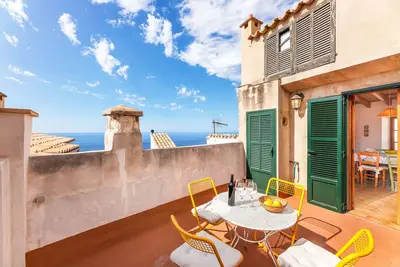 Image de Maison de vacances 'Ca Sa Padrina' avec vue sur la mer, terrasse privée et Wi-Fi