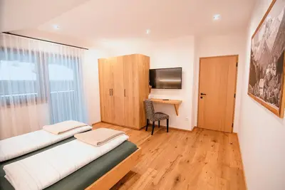 Image de Appartement 'Zum Sonnentor - Pinus' avec vue sur les montagnes, balcon et Wi-Fi