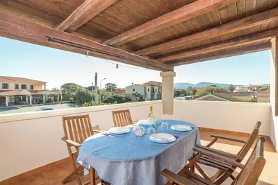 Image de Maison \"Trilocale con Ampia Veranda Mare\", avec climatisation & terrasse