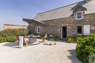Image de Maison bord de mer avec accès plage, équipements modernes et espace familial