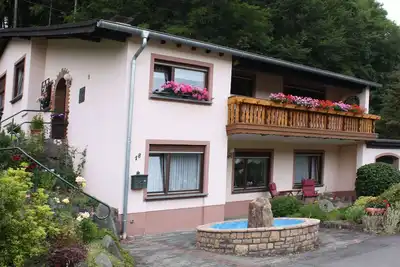 Image de Appartement confortable avec terrasse à Müllenborn