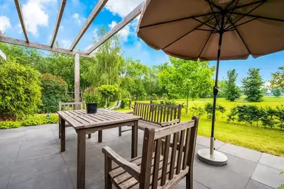 Image de Jolie maison de vacances à Vroomshoop avec jardin