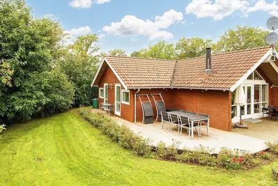 Image de Maison de vacances pour 8 a Allingåbro-By Traum