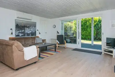 Image de Maison de vacances pour 6 a Allingåbro-By Traum