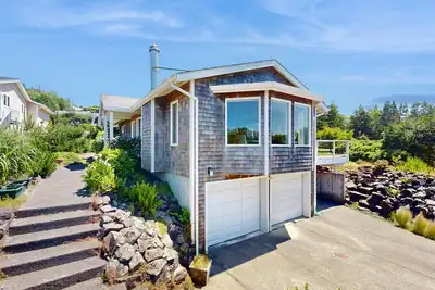 Stunning coastal home with ocean views, firepit & media room - walk to beach