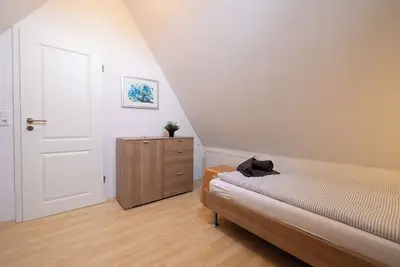 Image de Maison de vacances 'Mine Heimat 15' près de la mer avec jardin et Wi-Fi