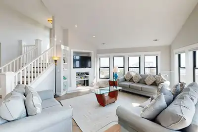 Stunning sound-front home with private hot tub, outdoor pool, & beach access