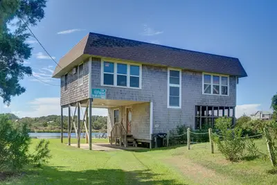 Image de Cove-front home with rooftop deck, boat dock, water views, & A/C