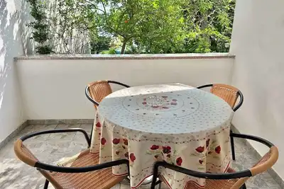 Image de Appartement de vacances avec terrasse et air conditionné